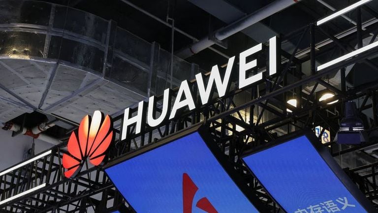 Huawei exhibition signage and screens in the Reuters report’s photograph